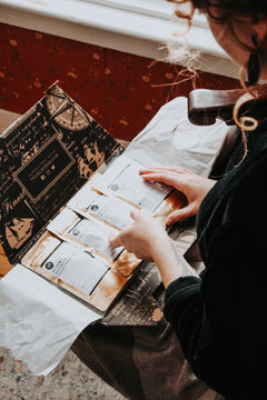 Recipient opening their box